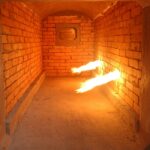 a brick tunnel with fire coming out of it